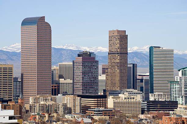 View of Denver Colorado Skyline.  Looking at city with mountains in background.  Converted from 14-bit Raw file.  sRGB color space.