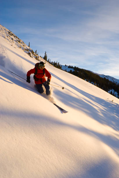 The winter view from the top of the Crested Butte ski area under a Colorado Rocky Mountain blue sky.