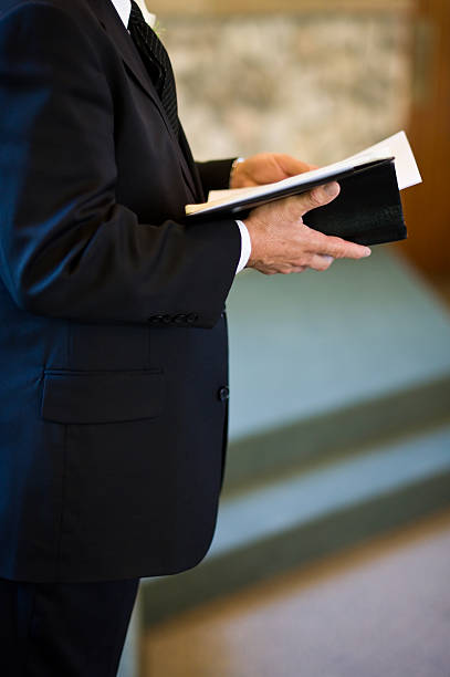 istock Preacher Man Reading Holy Bible in Church 134417151