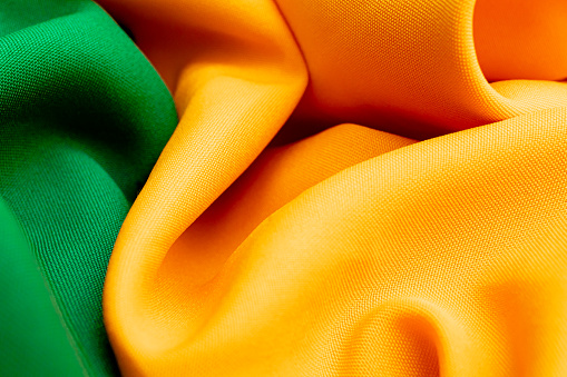 Antecedentes de Brasil. Fondo de textura de tela con colores verde y amarillo que recuerda los colores de la bandera brasileña. photo
