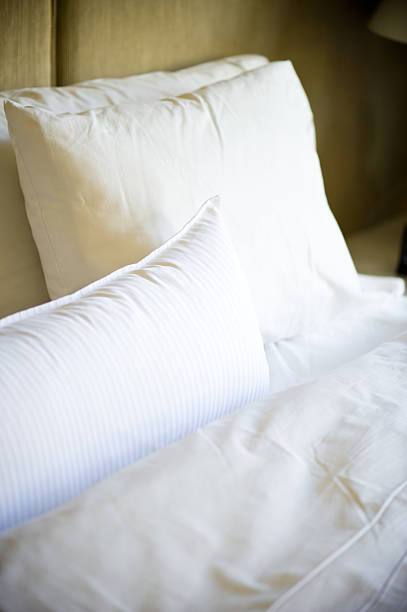 istock Soft Comfortable Pillows and Sheets on Bed in Bedroom 134418101