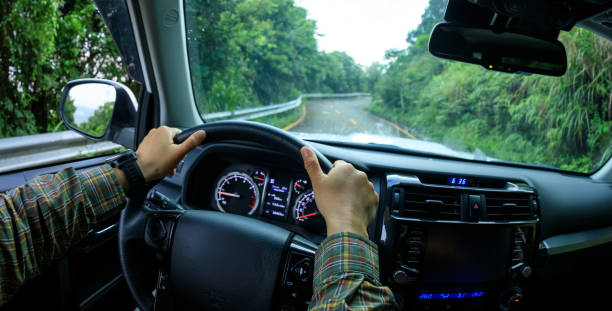 istock People driving car on morning mountain road 1344189188