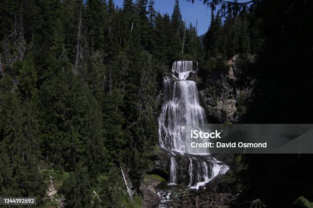 A Waterfall Cascading Down The Side Of A Mountainn Stock Photo - Download Image Now