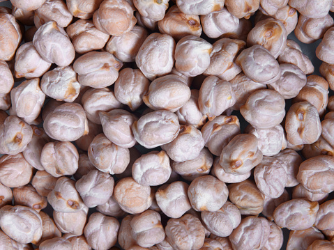 Pile chickpeas close-up background. Uncooked. dry