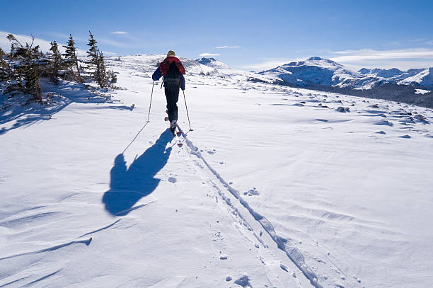 istock Lone Man on Ridge Ski Touring in the Mountains 134420476