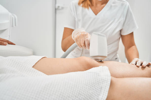 istock Focused photo on beautician doing laser epilation 1344204825