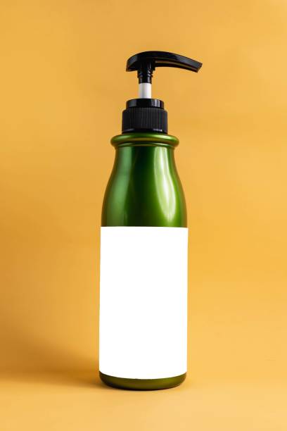 istock Green container with a pump to hold shampoo, shower gel, conditioner, white label ready for other ideas. 1344206149