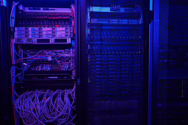 istock Shot picture of modern dark server room with neon blue 1344207032