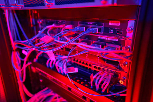 istock Details shot of patch cord cables connected to patch panel in database center 1344207119