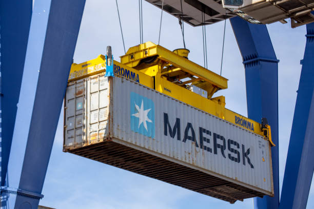 A Maersk Line container being loaded at the port of Mannheim (Germany stock photo