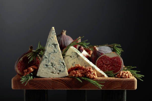 istock Blue cheese with figs, walnuts, and rosemary. 1344208570