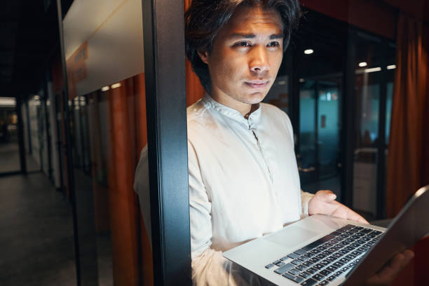 istock Tired man looking away with interest and thoughtfully 1344208854