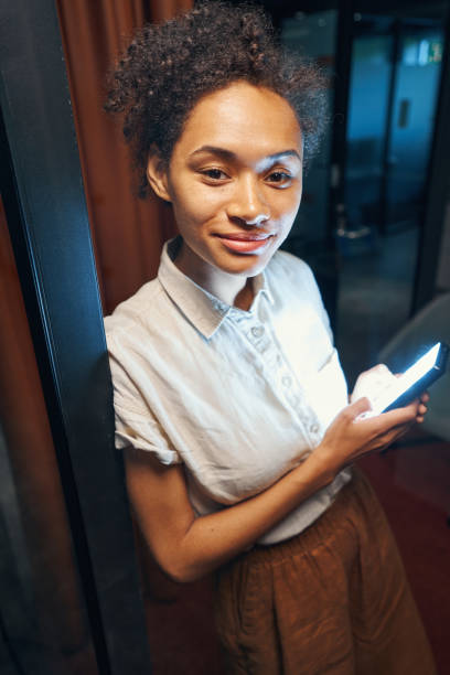 istock Employee searching information in smartphone for conference 1344210225