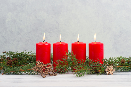 Red candles on a advent wreath, christmas decoration with candlelight