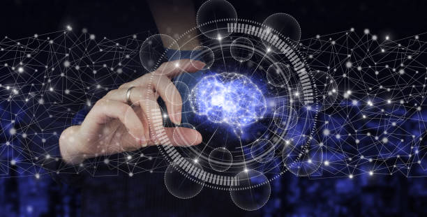 istock Artificial intelligence industry 4.0. Hand hold digital hologram Brain sign on city dark blurred background. Global database and artificial intelligence. 1344213136