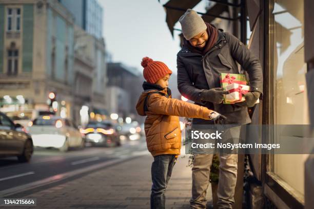 Father And Son Christmas Window Shopping Stock Photo - Download Image Now - Gift, Holiday - Event, Night