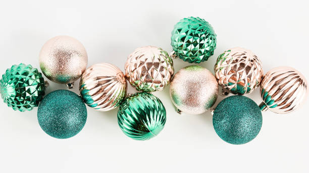 istock composition of gold and turquoise Christmas decorations on a white background. simple flat minimalist layout 1344216583