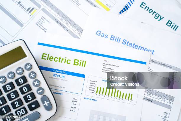 Electric Bill Statement And Home Energy Consumption Stock Photo - Download Image Now