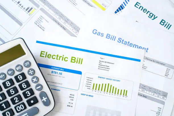Photo of Electric bill statement and home energy consumption