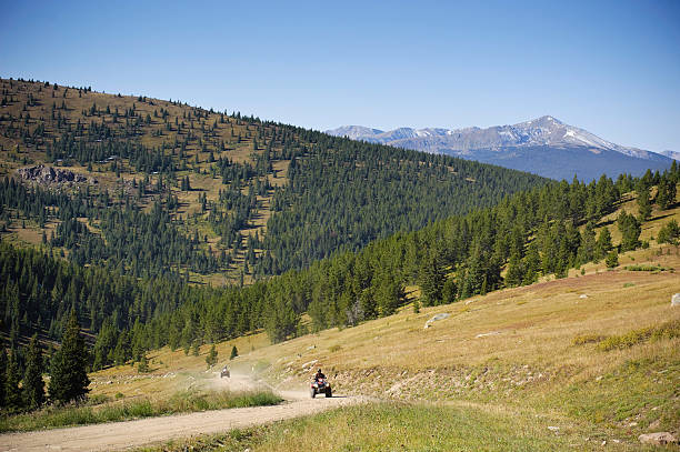 istock Two ATV Rednecks Haulin' Ass Up Mountain Road 134421761