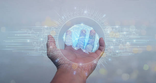 istock businessman holding digital image of brain in palm 1344218244