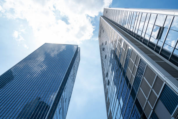 istock Looking Up Blue Modern Office Building，chongqing,china 1344219090