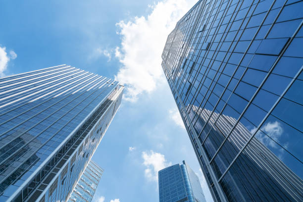 istock Looking Up Blue Modern Office Building，chongqing,china 1344219107
