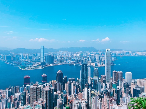 Hong Kong cityscape and Victoria Harbour, viewed from lugard road on the famous Victoria Peak.