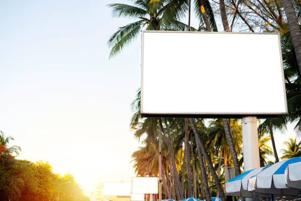 istock Billboard advertising on an avenue with a blue sky background. At the beach 1344220542