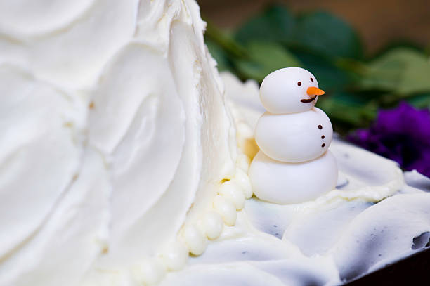 Snowman Detail on Wedding Cake Snowman Detail on Wedding Cake. ProPhoto RGB. wedding cake close up macro stock pictures, royalty-free photos & images