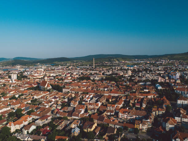 istock High Angle View Of Illuminated Buildings Against Blue Sky 1344224328