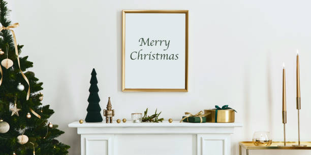 istock Christmas composition with gold mock up poster frame, white chimney and decoration. Christmas trees and wreath, candles, stars, light and elegant accessories. Template. 1344225049