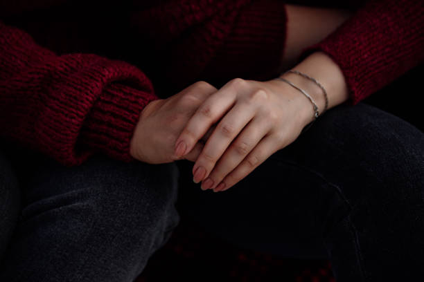 istock loving couple holding hands close up on blurred background 1344226952