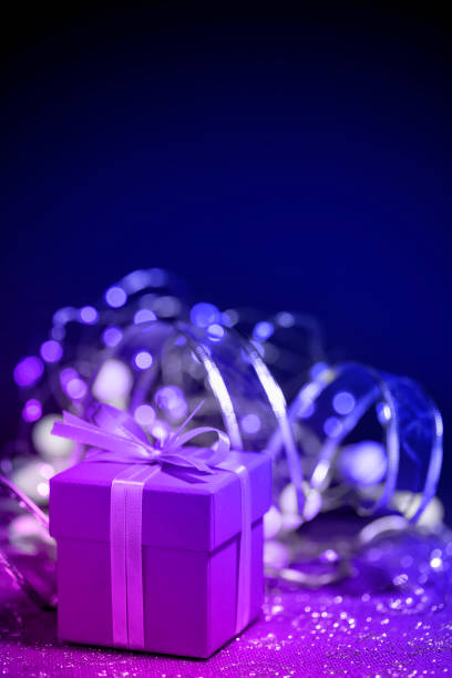 istock Merry Christmas !!! Christmas present, lights and ornaments with space for copy 1344227425