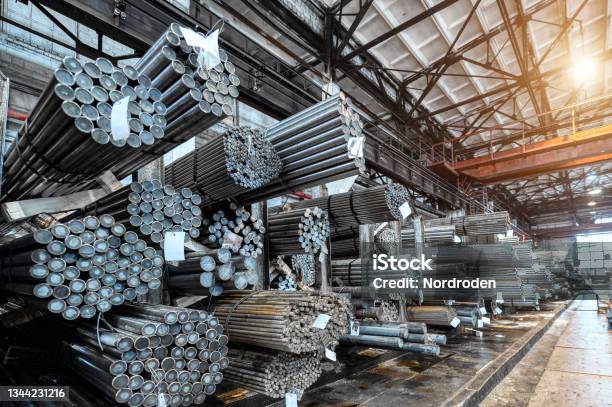 Rolled Metal Warehouse Many Packs Of Metal Bars On The Shelves Stock Photo - Download Image Now