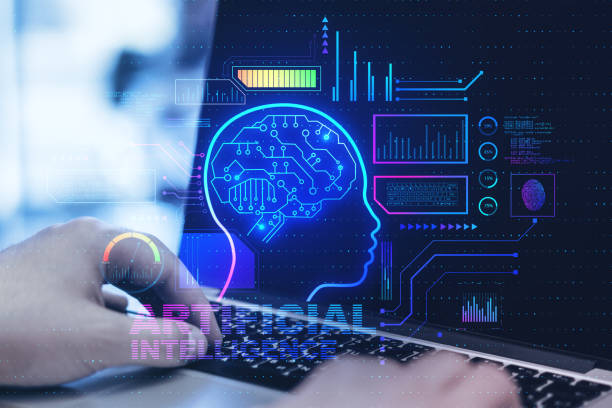 istock Close up of hands using laptop with abstract glowing AI head interface on blurry background. Artificial intelligence and cyberspace concept. Double exposure. 1344231390