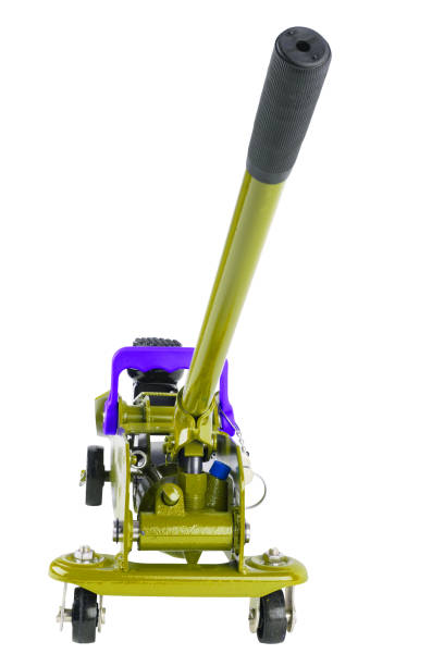istock yellow hydraulic car jack isolated on white background, lowered 1344232785