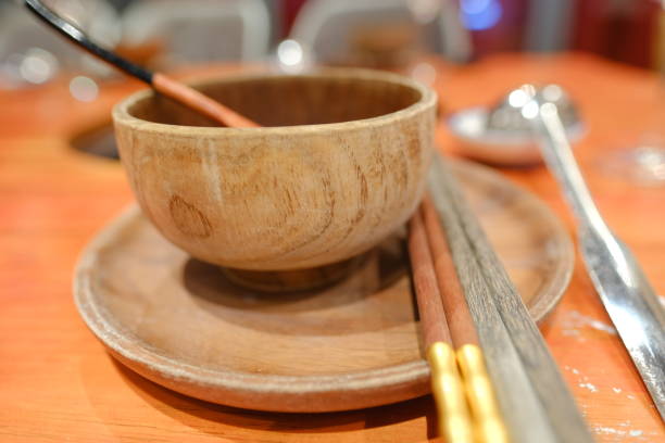 istock Wooden bowl and chopsticks 1344237990