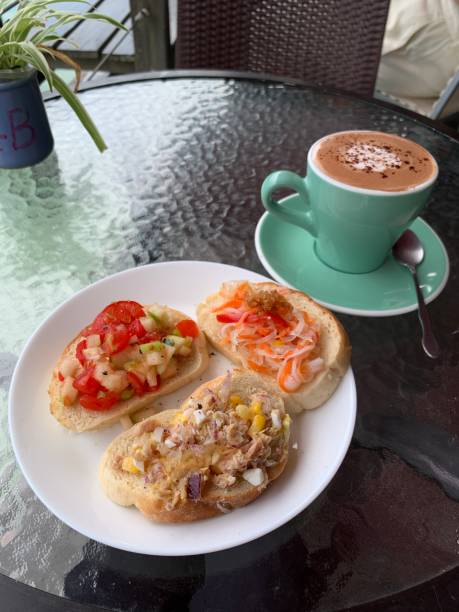 istock Toasts and Hot Chocolate in a Riverside Cafe 1344238035