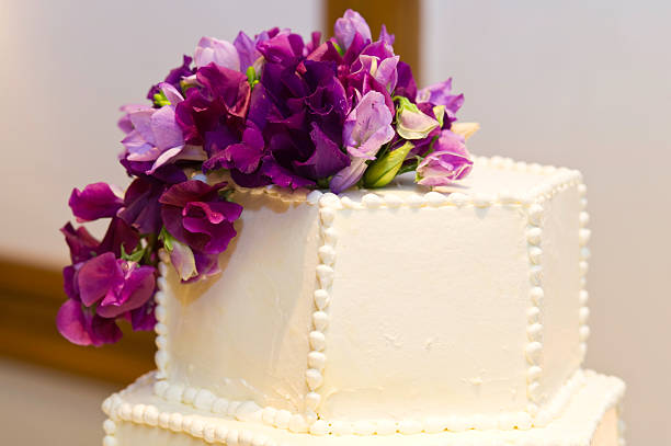 istock Wedding Cake Top With Purple Flowers 134423978