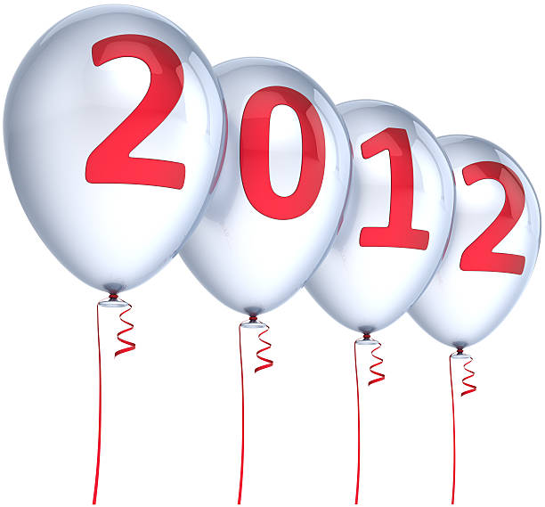 istock New Year 2012 helium balloons colored white with red date 134424272