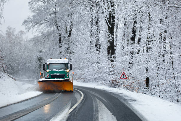 istock Snow plow on a snow-covered road 1344243672