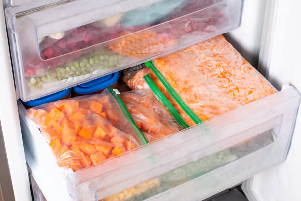 istock Frozen pumpkin in a plastic bag. Vegetables containing carotene. 1344244972