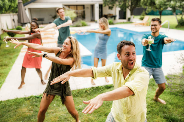 istock Dancing on a party by the pool! 1344245050