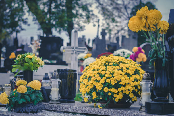 istock All Saints Day, funeral concept with colorful grave adornment 1344245196
