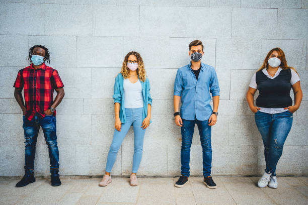 istock Group of students keeping a social distance 1344247467