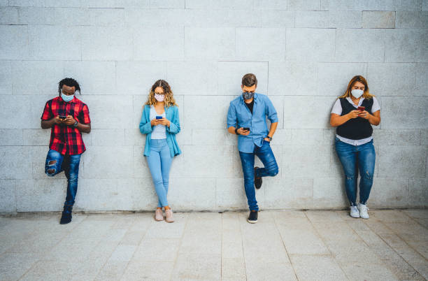 istock Group of students keeping a social distance 1344249050