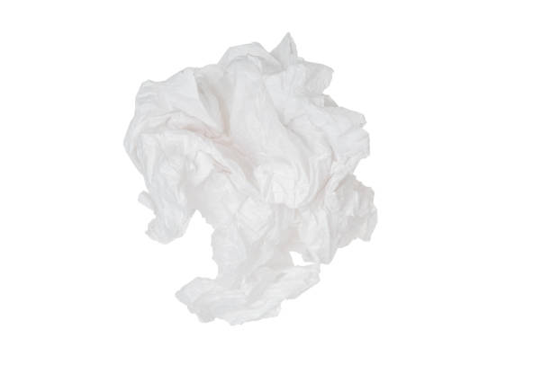 istock Crumpled paper ball close up on white background 1344250465