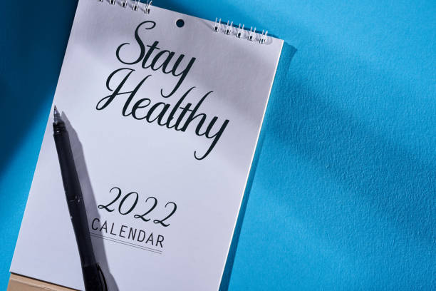 istock 2022 Desk Calendar on blue background 1344250759