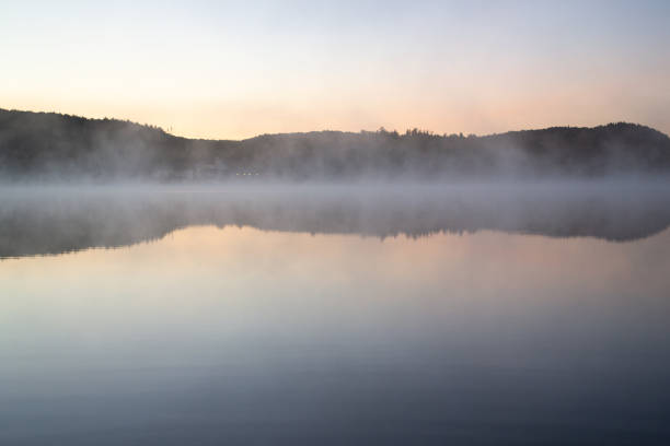 istock Misty Lake Sunrise 1344250775
